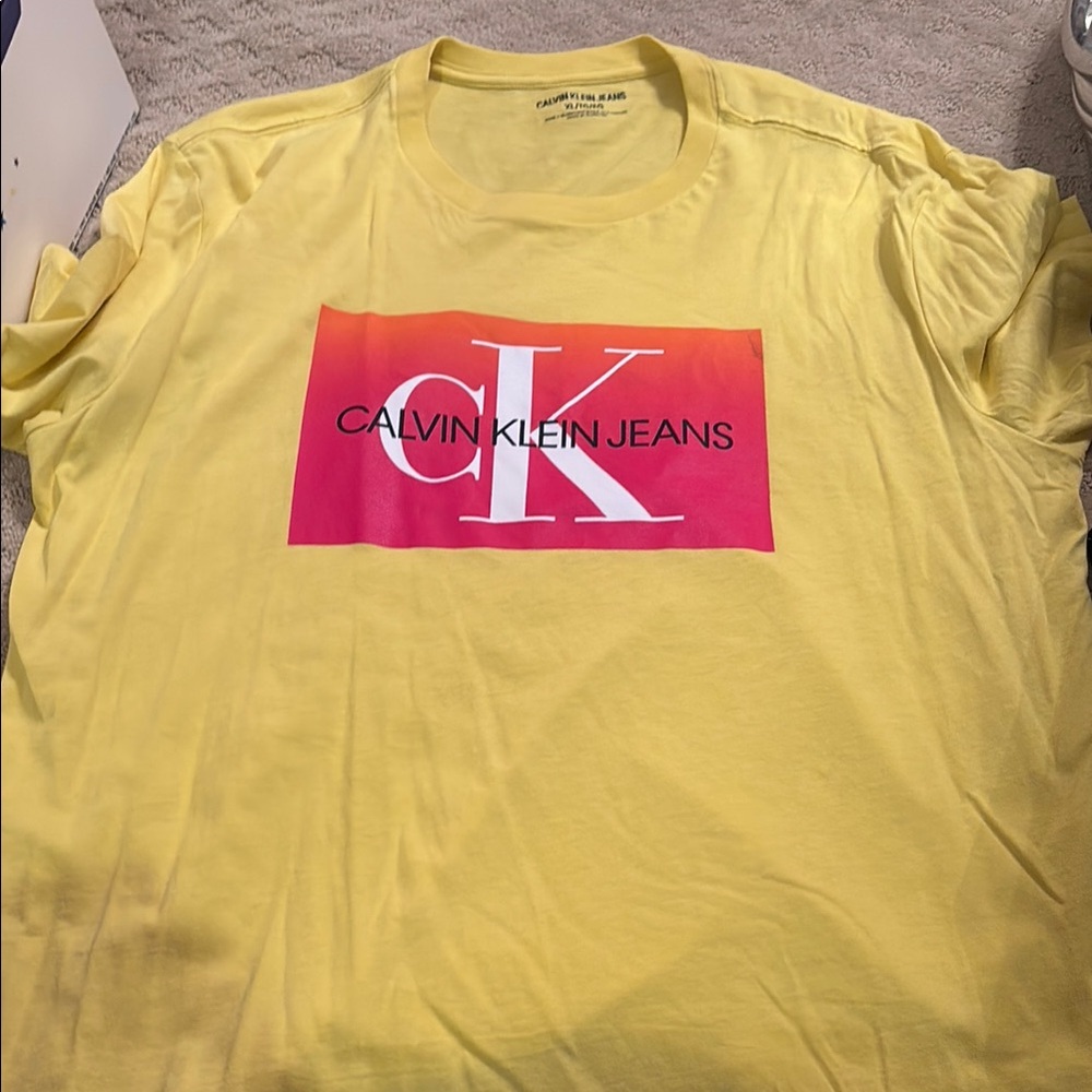 Calvin Klein Vibrant Yellow Tee with Pink Graphic
